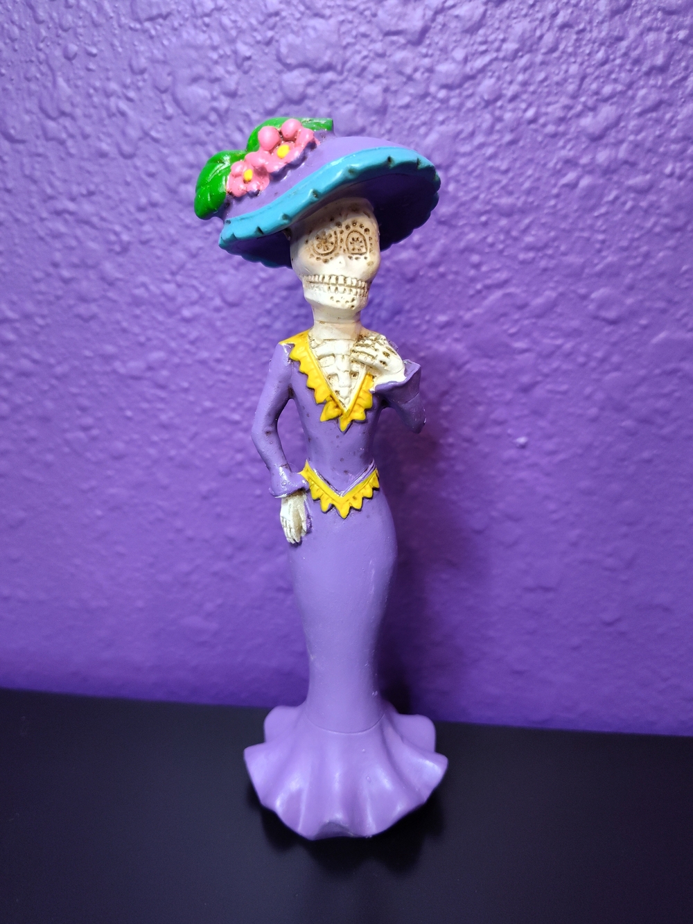 Purple Catrina Figurine with Blue Hat and Yellow Trim